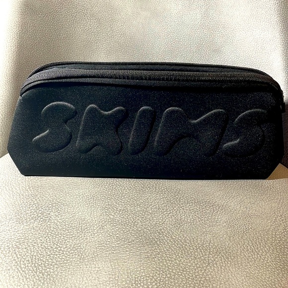 SKIMS Handbags - NWOT. SKIMS Black Neoprene Pouch/Bag Clutch for Shapewear Makeup Lingerie